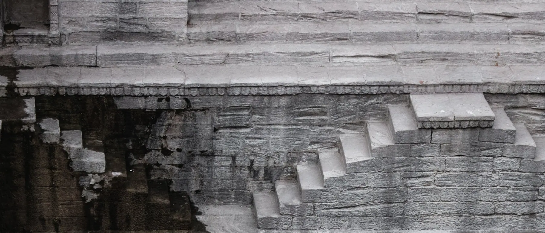 Stepped stone descent cut into a quarry face